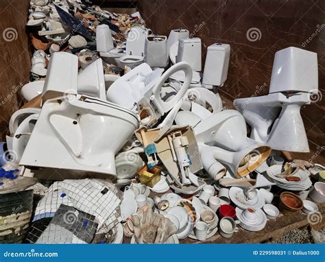 Ceramic Trash in a Recycling Container. Broken Toilet Seats, Kitchen Ceramic Ware, Broken Cups ...