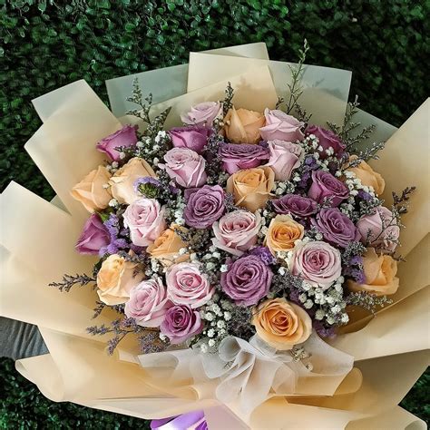 Pastel colour roses hand bouquet - Blooming Florist