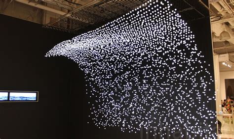 View this mesmerizing LED art installation from a distance to reveal its delightful surprise ...