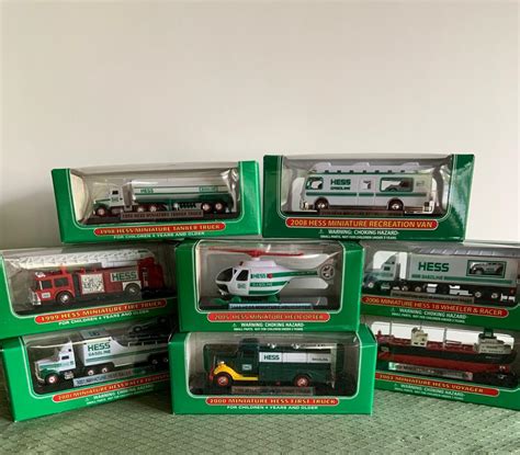 LOT:60G: Eight (8) Hess Mini Vehicles in Original Boxes | EstateSales.org