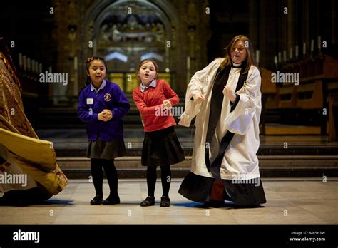 Liverpool Cathedral Rev Kate Bottley of Gogglebox fame with children Stock Photo - Alamy