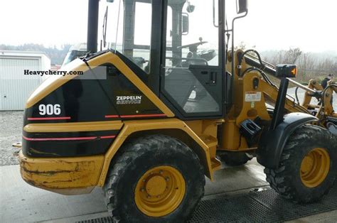 CAT 906 2002 Wheeled loader Construction Equipment Photo and Specs