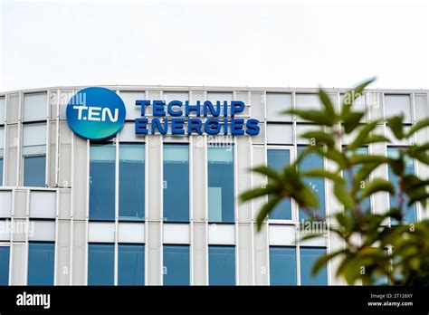 Sign and logo on the facade of the headquarters of Technip Energies, a ...