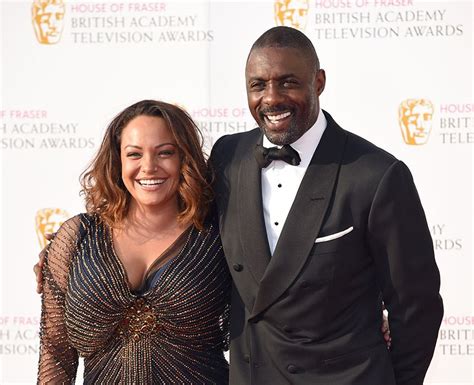 Idris Elba walks BAFTA red carpet with Naiyana Garth