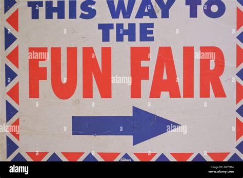 'This Way to the Fun Fair' sign Stock Photo - Alamy