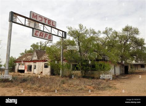 Trees overtake the abandoned Texas Longhorn Motel and State Line Cafe ...