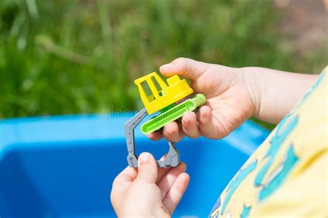 Little Kid is Playing in Sandbox with His Truck Toy Stock Image - Image ...