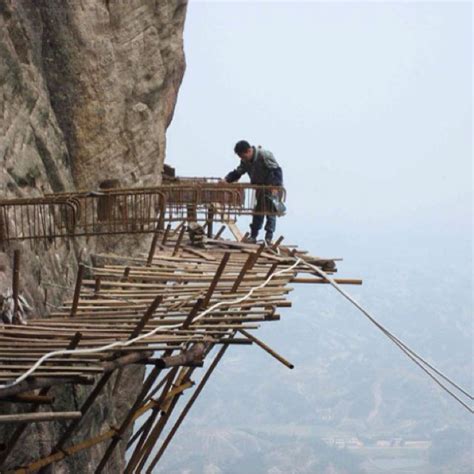 Building the walkway at Huangshan China | Dangerous roads, Tianmen ...