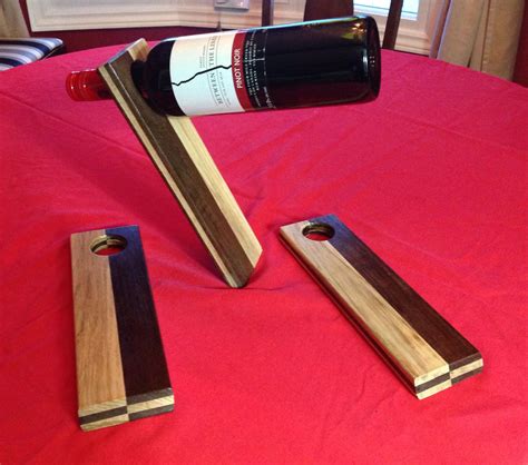 Wine bottle holder. Made from walnut and ash. 30 degree angle to balance on | Wine bottle ...