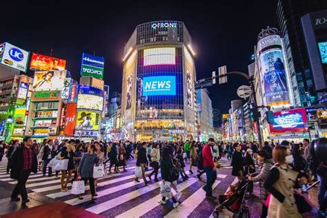 TOKYO, JAPAN - March 21, 2016 - Shibuya Crossing at Night, a Pedestrian Scramble in Shibuya ...