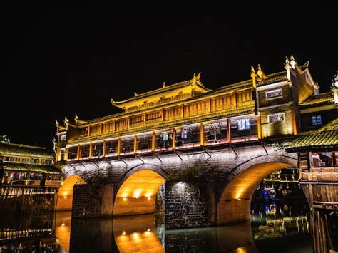 Premium Photo | Scenery view in the night of fenghuang old town .phoenix ancient town or ...