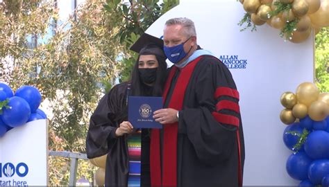 Hancock College holds drive-up commencement ceremony for 100th ...