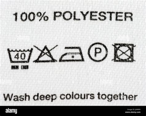 wash washing clothing instructions label polyester synthetic cloth Stock Photo: 141477373 - Alamy