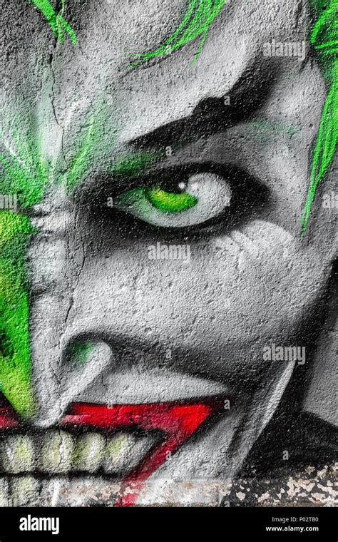 Detail of a graffiti with painting face. Street Art/Graffiti by unknown artist Stock Photo - Alamy