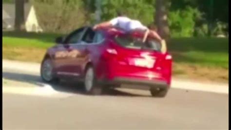 Video of teens 'car-surfing' in west Omaha parking lot goes viral