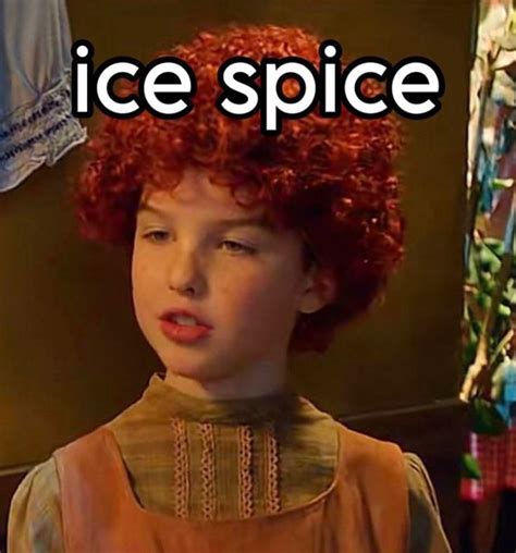 a young boy with red curly hair wearing an orange top and text that reads ice spice