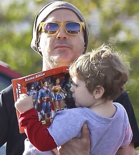 Robert Downey Jr. and his son Exton, toy shopping, February 27, 2014