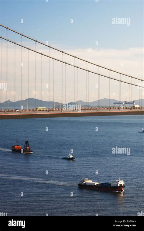 Ships Passing Under Tsing Ma Bridge, Tsing Yi, Hong Kong Stock Photo ...