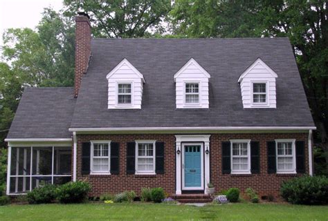 red brick house with black shutters - Treats Weblogs Slideshow