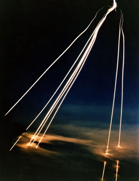 A time exposure of eight Peacekeeper (LGM-118A) intercontinental ballistic missile reentry ...