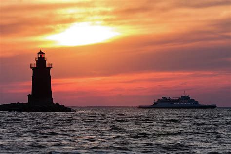 Light House and Cape May-Lewes Ferry at Sunset Photograph by David Wolanski - Pixels