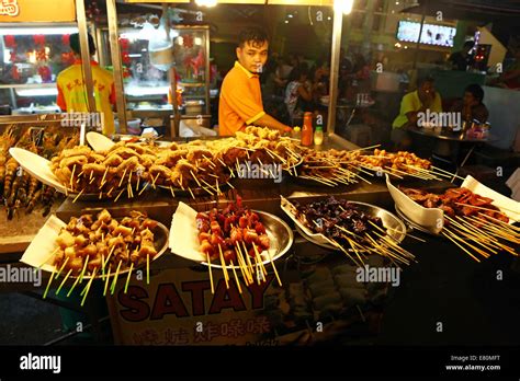 Satay stall with street food in Jalan Alor in Bukit Bintang in Kuala Lumpur, Malaysia Stock ...