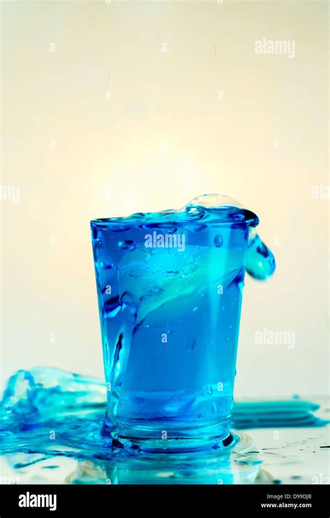 water spilling over glass Stock Photo - Alamy