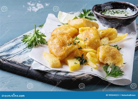 Fish and chips with sauce stock image. Image of plate - 99504523