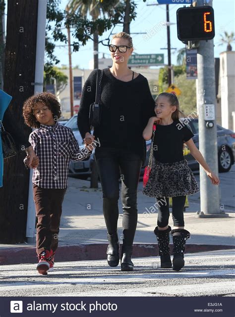 Heidi Klum and family with her parents Erna and Gunther, cross the road ...