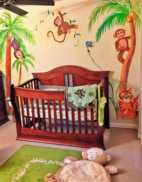 Jungle themed nursery mural | Nursery mural, Jungle themed nursery, Nursery themes