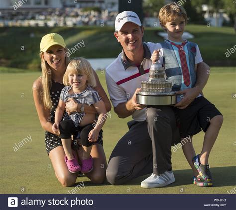 Justin Rose celebrates winning the Quicken Loans National with his ...