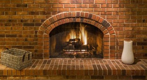 Fixr.com | Brick vs Stone Fireplace - Pros, Cons, Comparisons and Costs