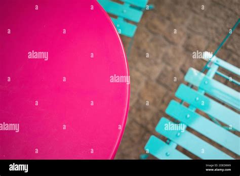colourful metal table and chairs Stock Photo - Alamy