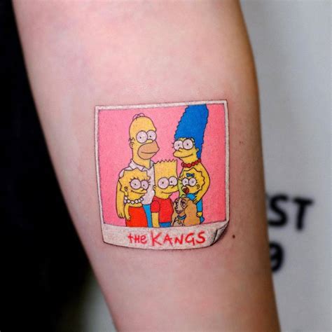 The Simpsons tattoo located on the inner forearm.