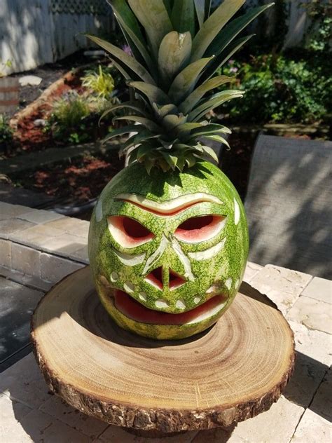 Tiki watermelon carving for family reunion luau event. # ...