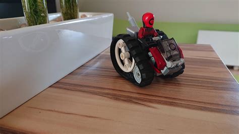 Recently got back into Lego. Built this little tracked ATV : lego