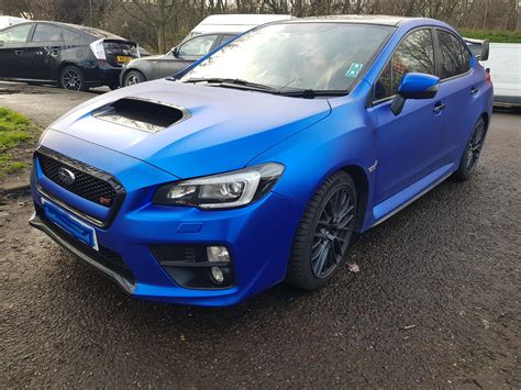 My dad's 2017 WRX STi in a Satin Blue wrap : subaru