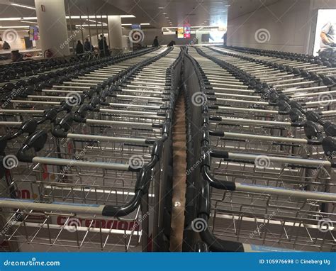 Luggage Trolleys in Airport Editorial Stock Photo - Image of gate, arrivals: 105976698