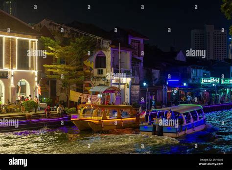 Malacca River Cruise boat sailing down the Malacca river at night Stock ...