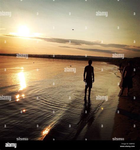 Chilling on the beach Stock Photo - Alamy