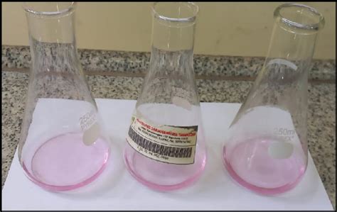 The addition of phenolphthalein indicator produced a pink color at the ...