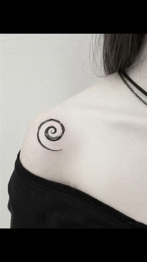 Black and White Spiral Tattoo on Shoulder