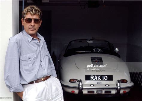 Record producer and songwriter Mickie Most, portrait with his Porsche ...