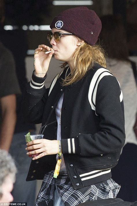 What's going on here? Cara Delevingne was spotted smoking a suspicious ...