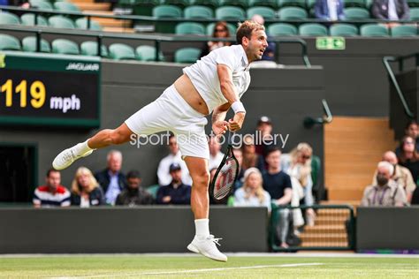 Dan Evans Great Britain serves v Dusan Lajovic Wimbledon 2021 Images ...