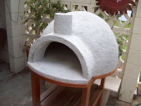 Pizza oven cast on gym-ball using pumice concrete or refractory ...