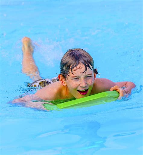 Teen Boy Swimming in the Pool Stock Image - Image of caucasian, outdoor ...