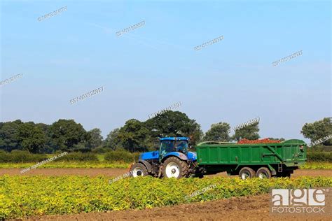 blue tractor and trailer, Stock Photo, Picture And Low Budget Royalty ...