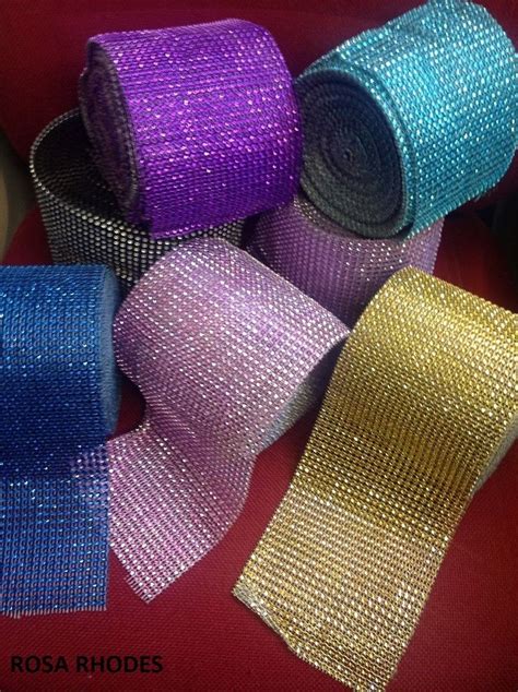 several different colors of mesh ribbons on a red table with purple, blue and yellow