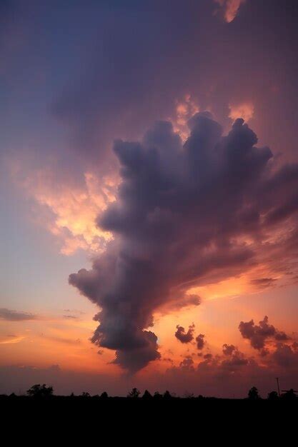 Premium Photo | Beautiful clouds at sunset at skyscraper purple sunset and silhouetted clouds